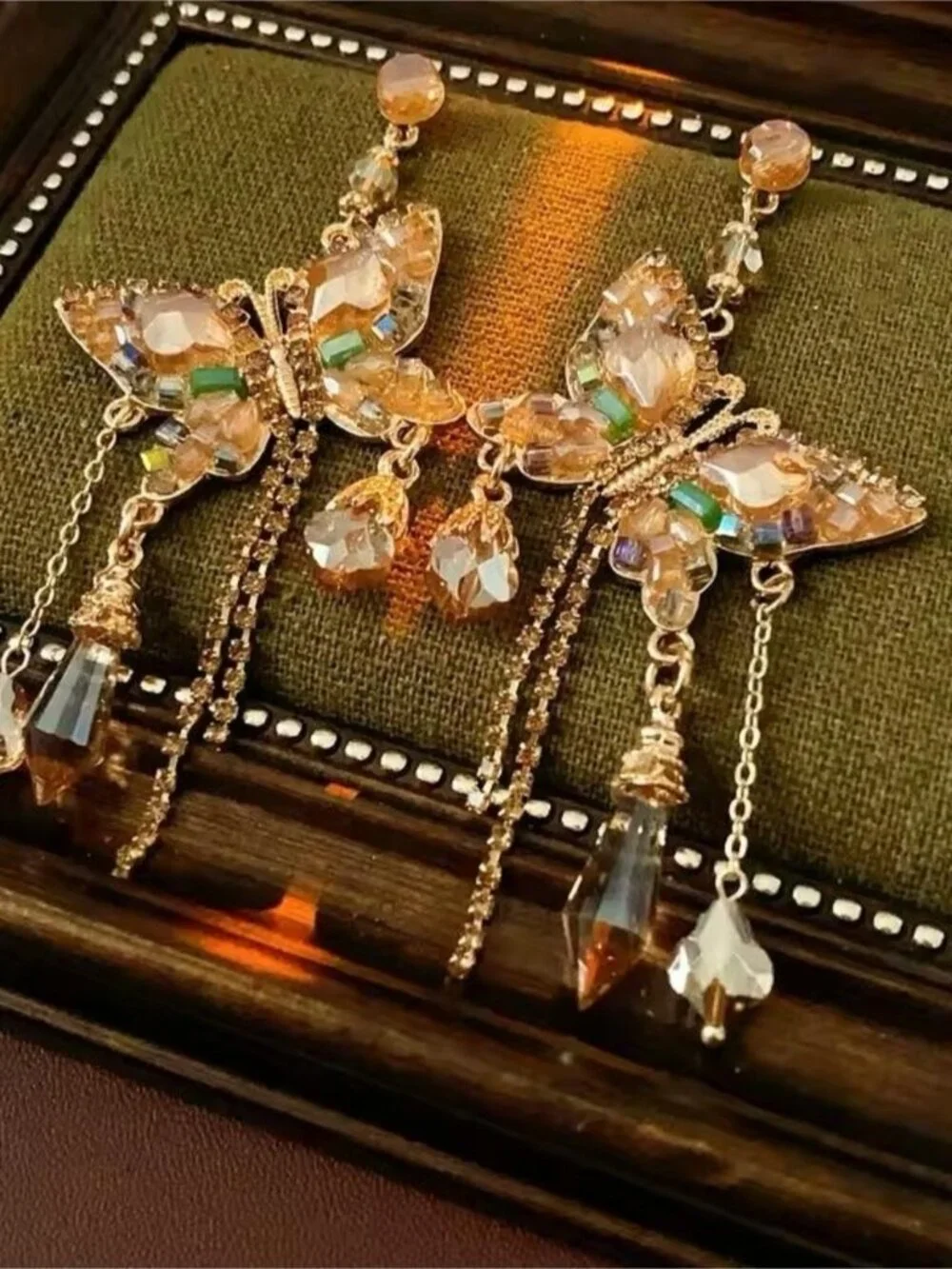 Gold Crystal Butterfly Drop Earrings with Green Accents